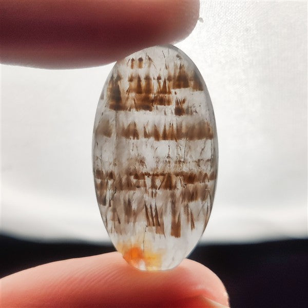 Cacoxenite in Quartz Cabochon