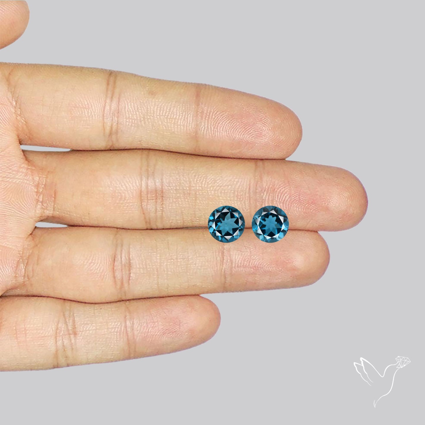 Faceted London Blue Topaz Pair