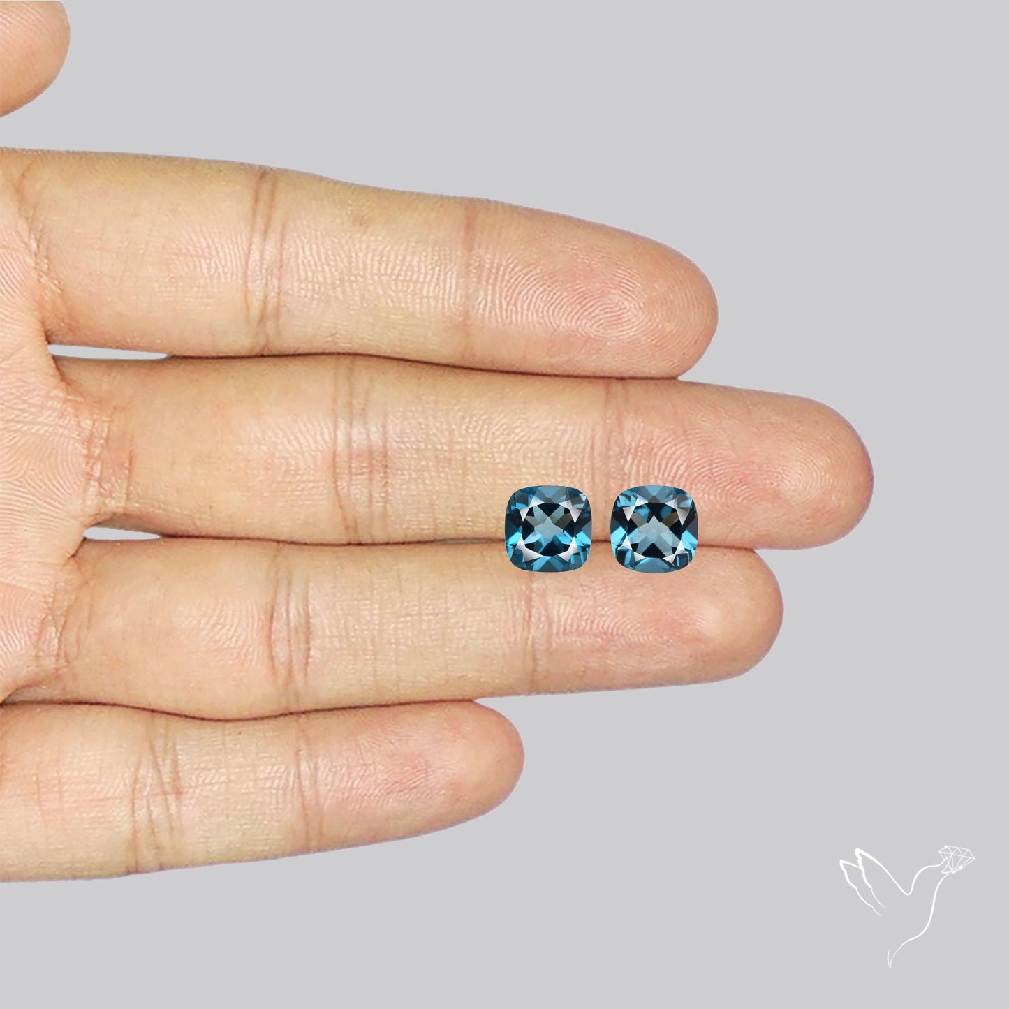 Faceted London Blue Topaz Pair