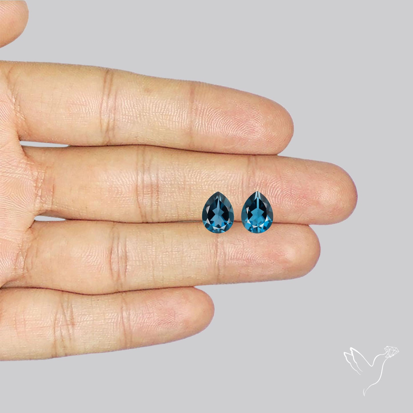 Faceted London Blue Topaz Pair