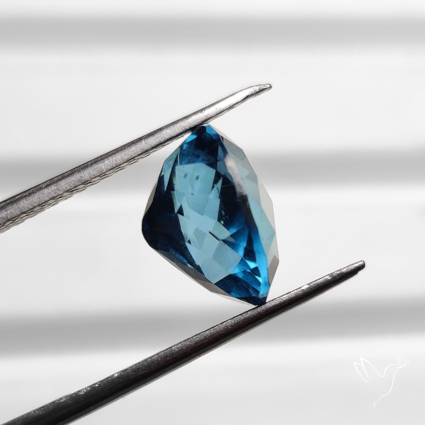 Faceted London Blue Topaz with Checker Facets