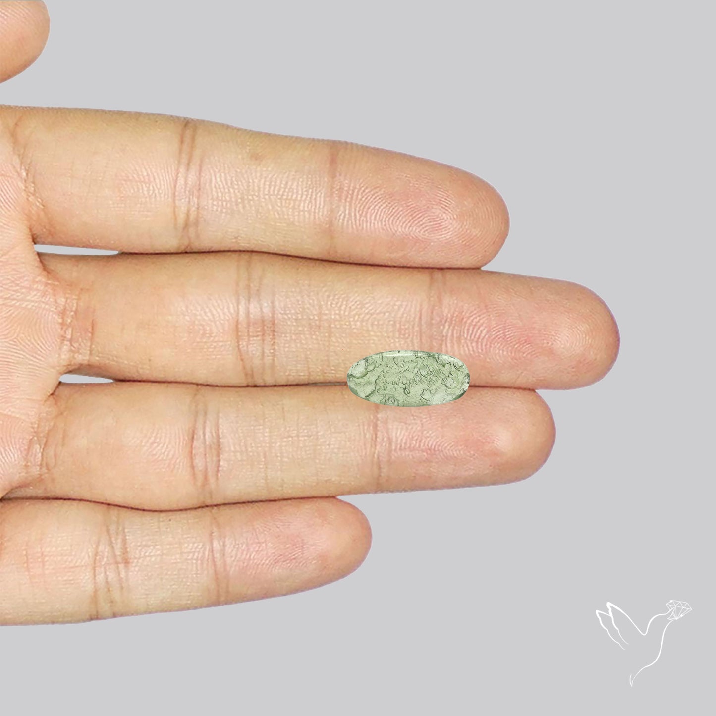 Moldavite Cabochon with Natural Raw Back