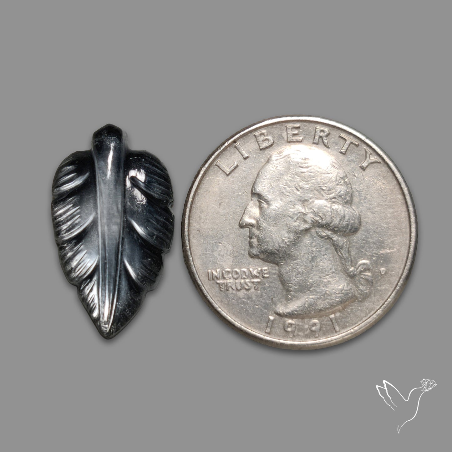 Himalayan Quartz With Hematite Leaf Carving Doublet