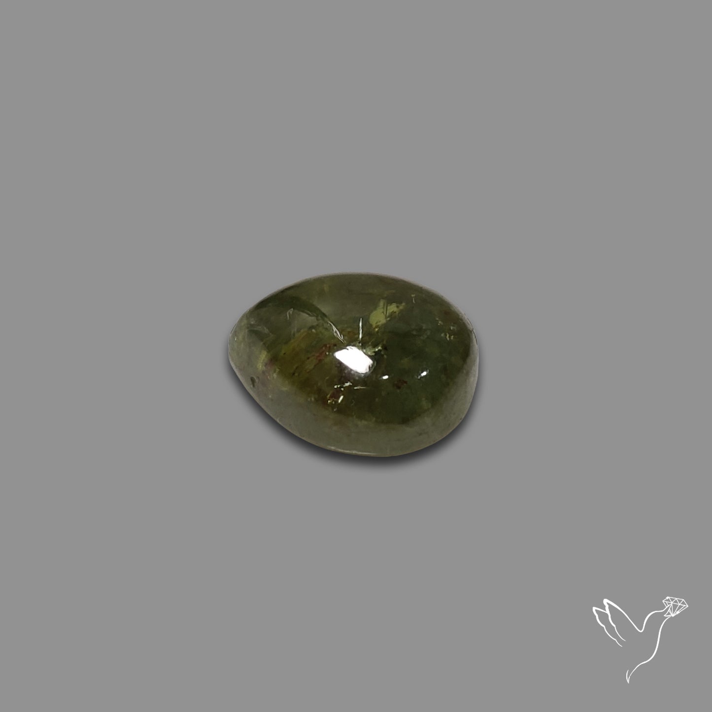 Rare Ural Demantoid Garnet Cabochon