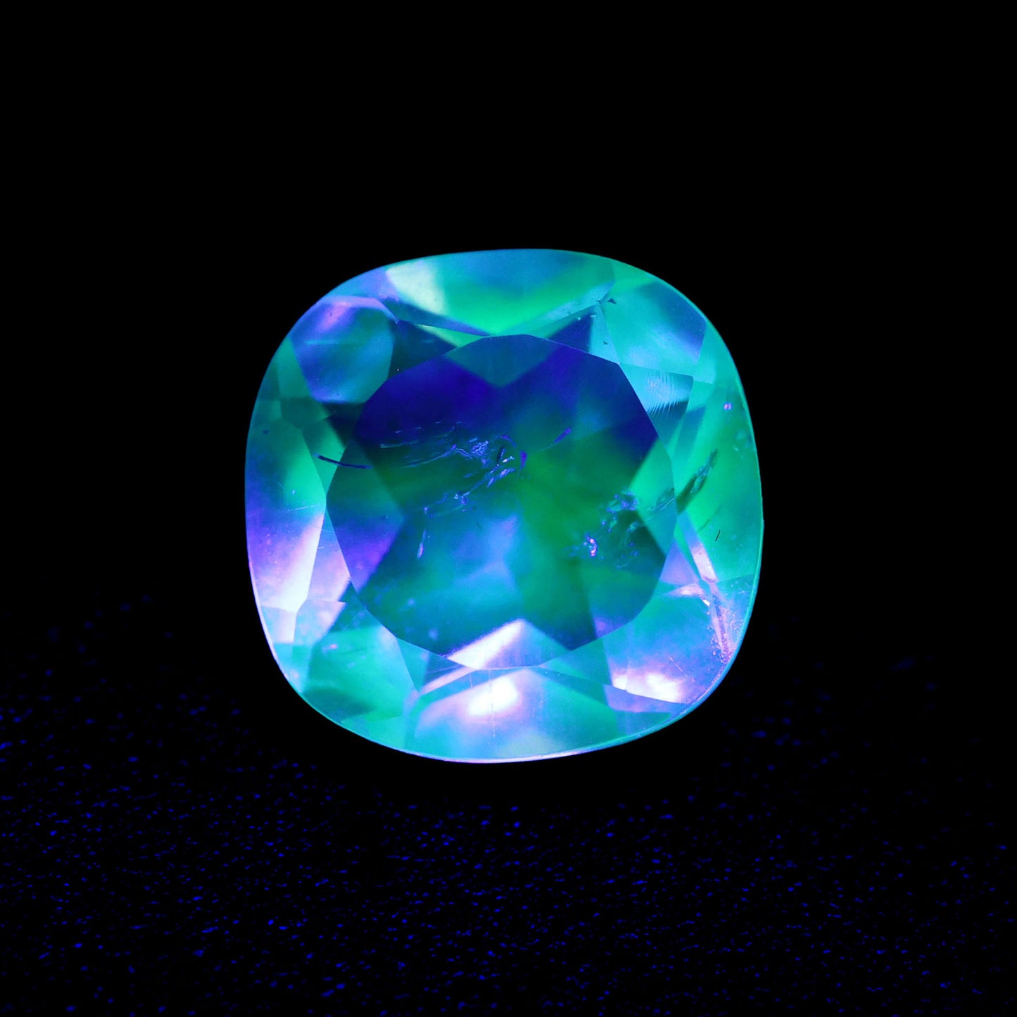 Hyalite Opal Faceted Fluorescent under UV Light
