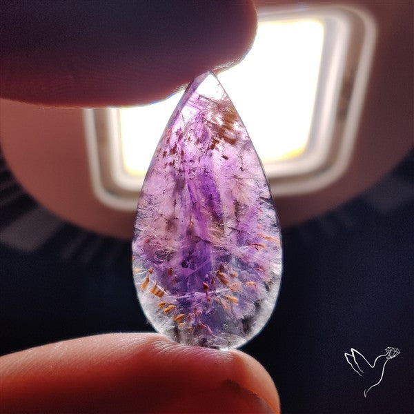 Super Seven Amethyst with Cacoxenite Cabochon