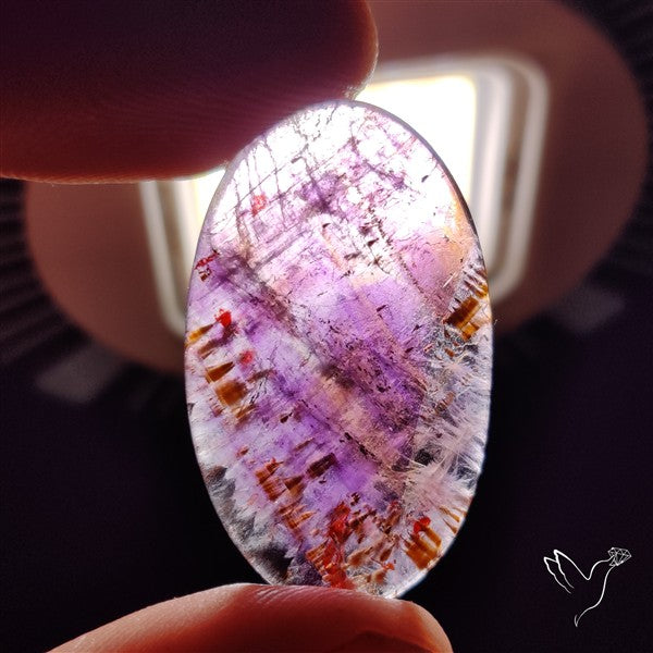 Super Seven Amethyst with Cacoxenite Cabochon