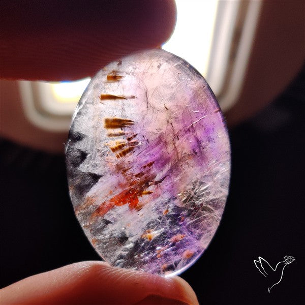 Super Seven Amethyst with Cacoxenite Cabochon