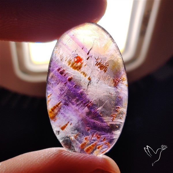 Super Seven Amethyst with Cacoxenite Cabochon