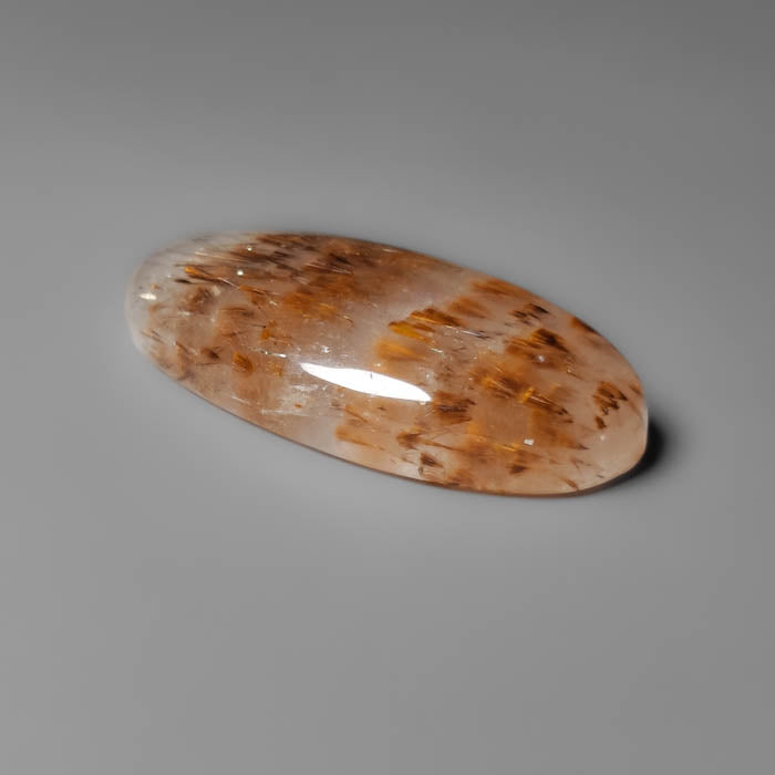 Cacoxenite in Quartz Cabochon
