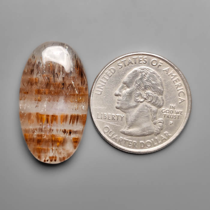 Cacoxenite in Quartz Cabochon