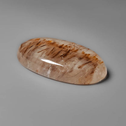 Cacoxenite in Quartz Cabochon