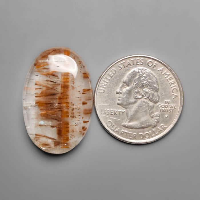 Cacoxenite in Quartz Cabochon