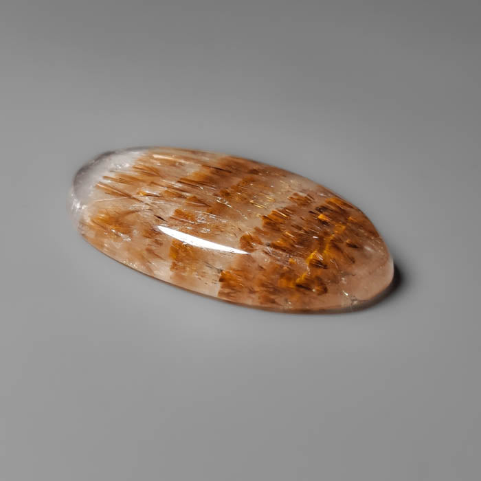 Cacoxenite in Quartz Cabochon