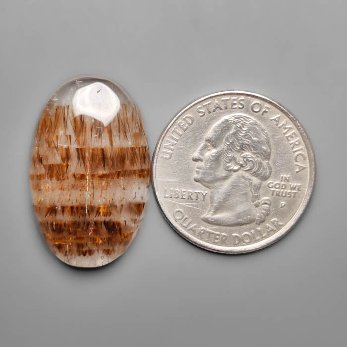 Cacoxenite in Quartz Cabochon
