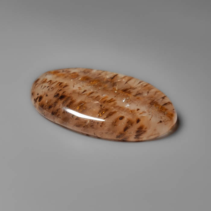 Cacoxenite in Quartz Cabochon