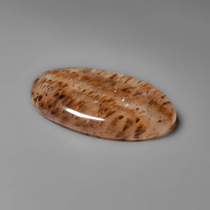 Cacoxenite in Quartz Cabochon