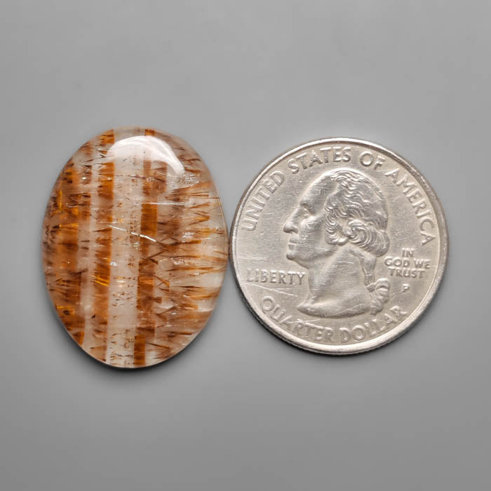 Cacoxenite in Quartz Cabochon