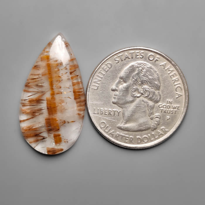 Cacoxenite in Quartz Cabochon