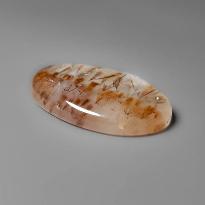 Cacoxenite in Quartz Cabochon