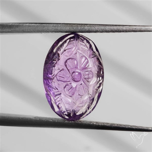 Faceted Amethyst Reverse Intaglio Carving