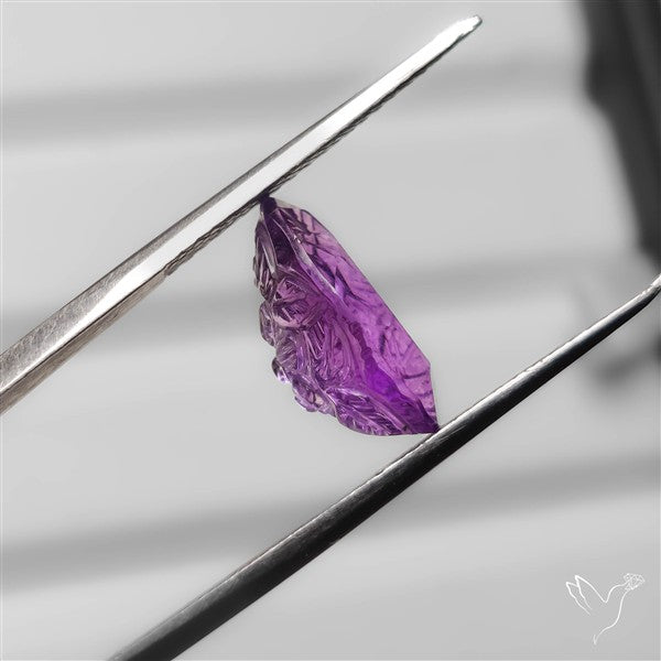 Faceted Amethyst Reverse Intaglio Carving