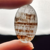 Cacoxenite in Quartz Cabochon