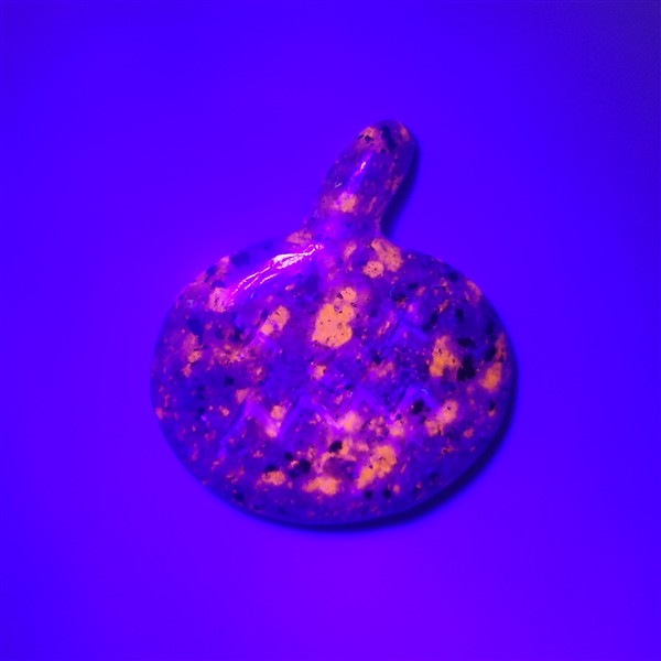 Yooperlite Jack-O-Lantern Carving (glows orange under UV Light)