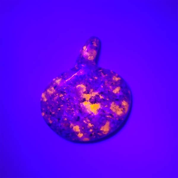 Yooperlite Jack-O-Lantern Carving (glows orange under UV Light)