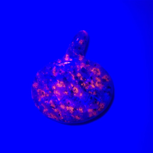 Yooperlite Jack-O-Lantern Carving (glows orange under UV Light)