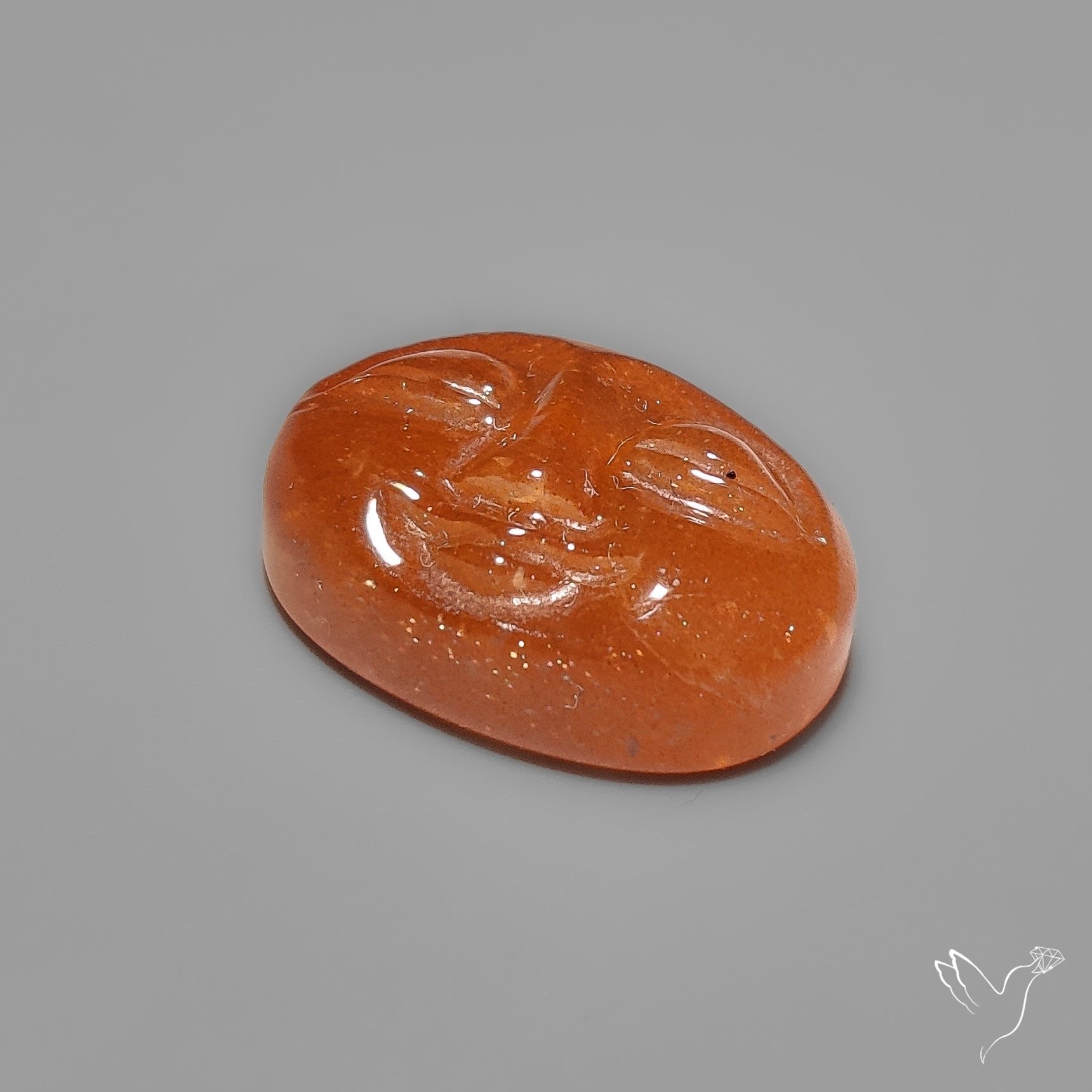 Sunstone Oval Moonface Carving