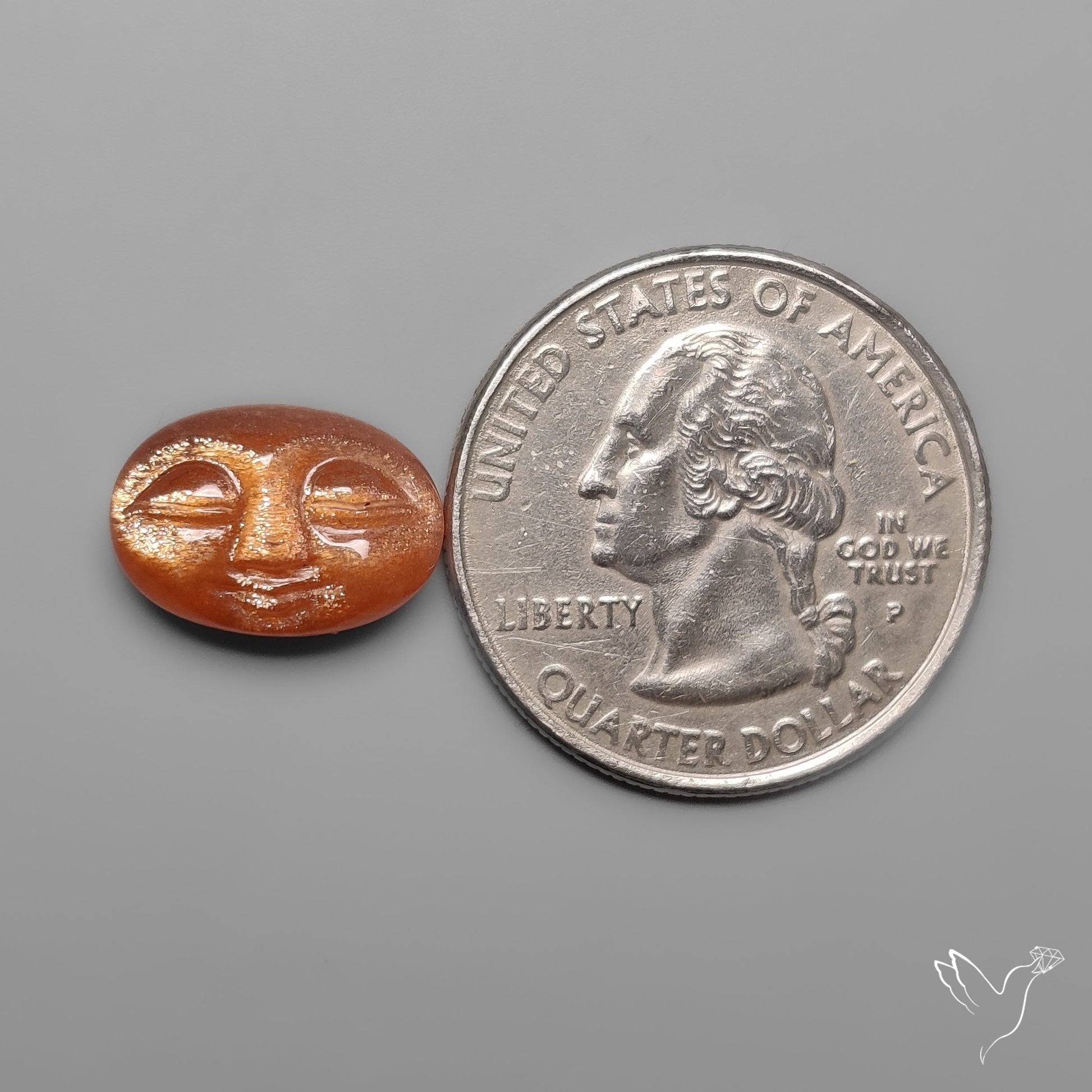 Sunstone Oval Moonface Carving