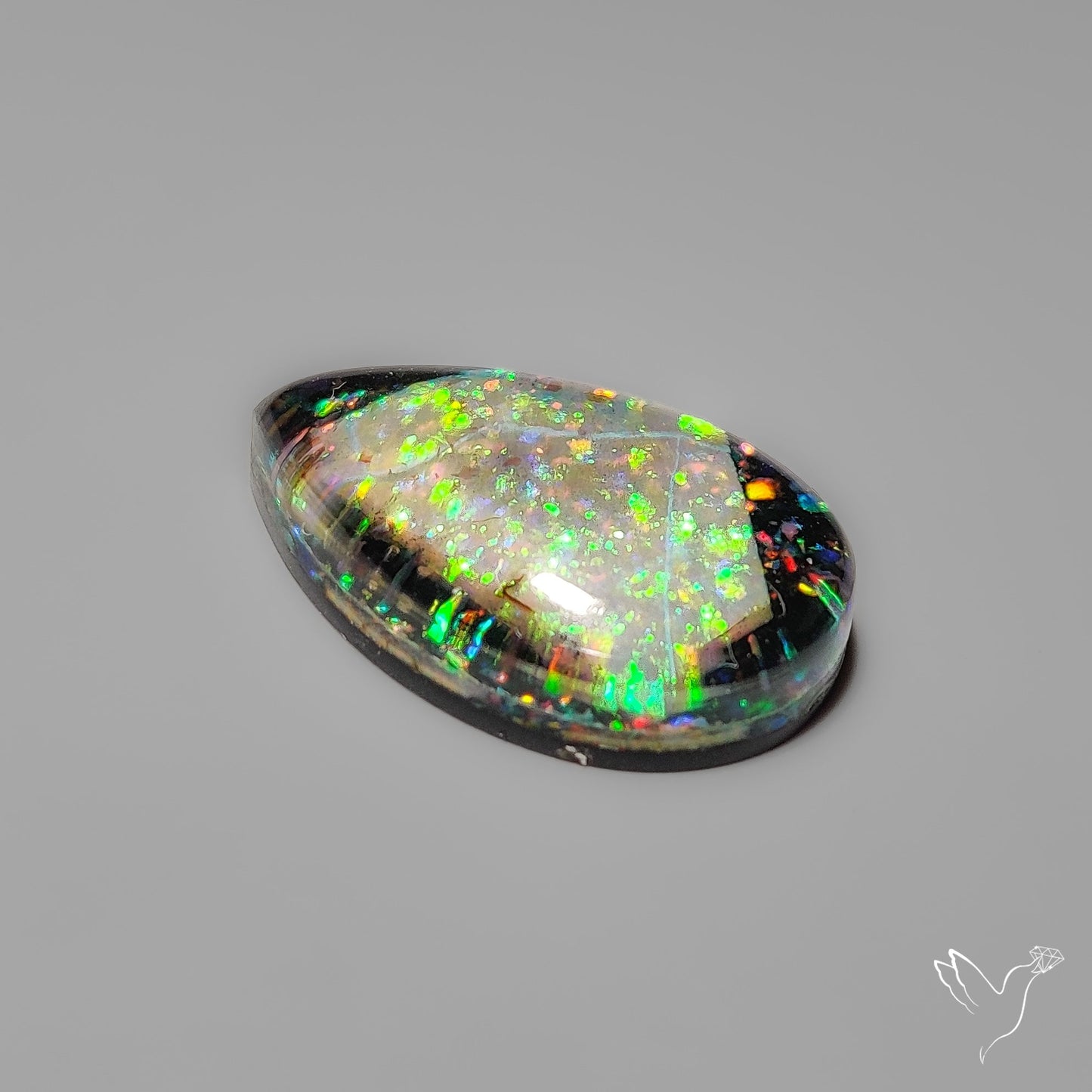 Crushed Monarch Opal Inlay Doublet with Quartz Cabochon