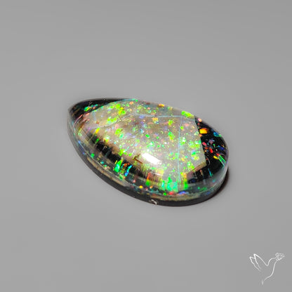 Crushed Monarch Opal Inlay Doublet with Quartz Cabochon
