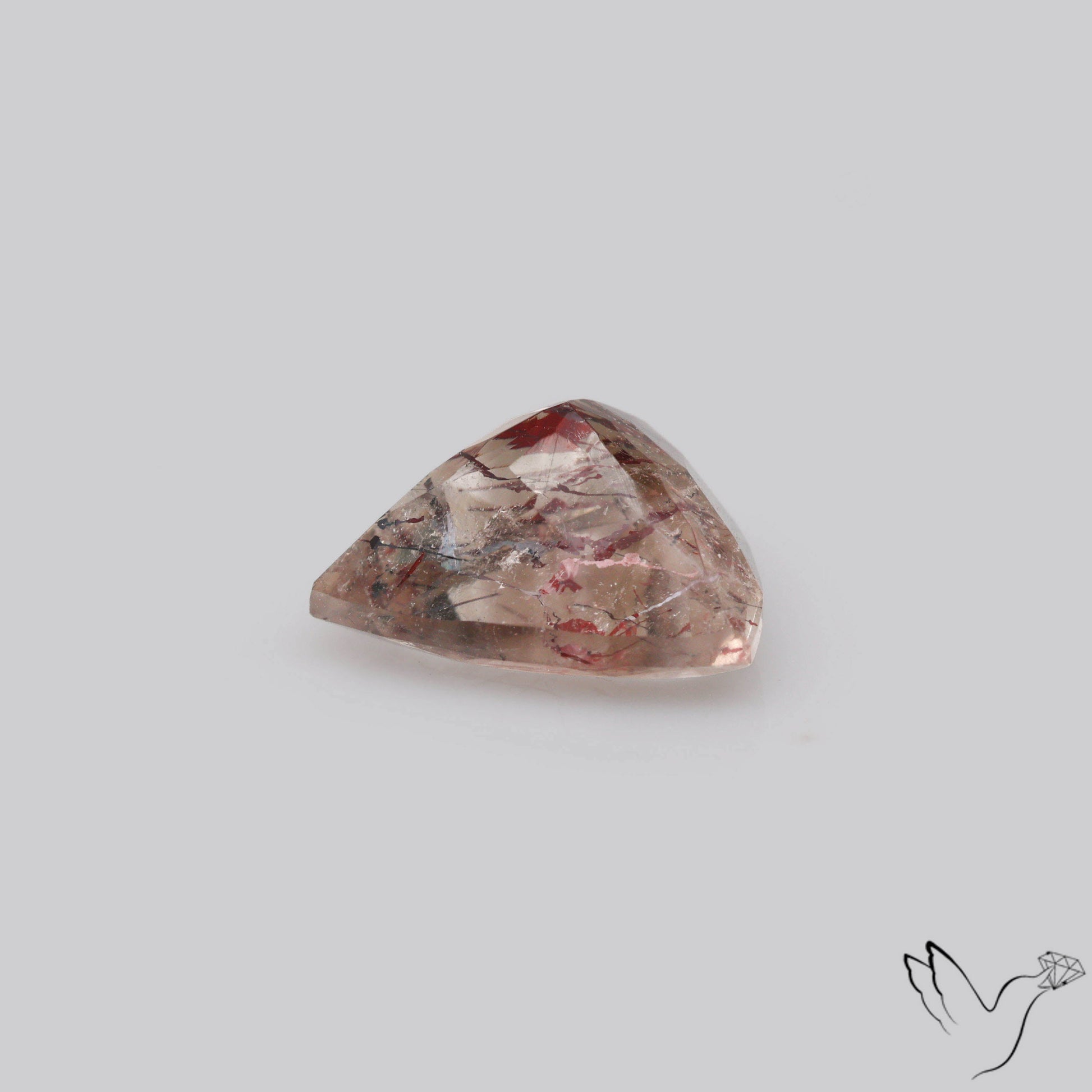 Lepidocrocite In Quartz Faceted