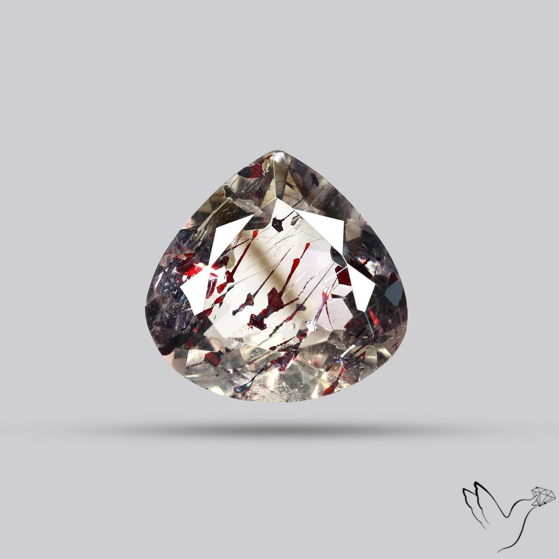 Lepidocrocite In Quartz Faceted