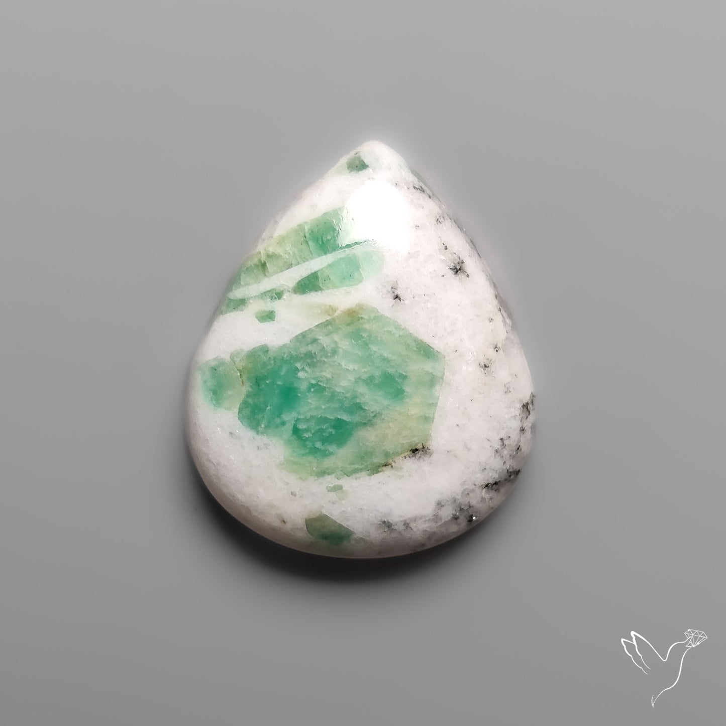 Rare Emerald in Quartz Cabochon