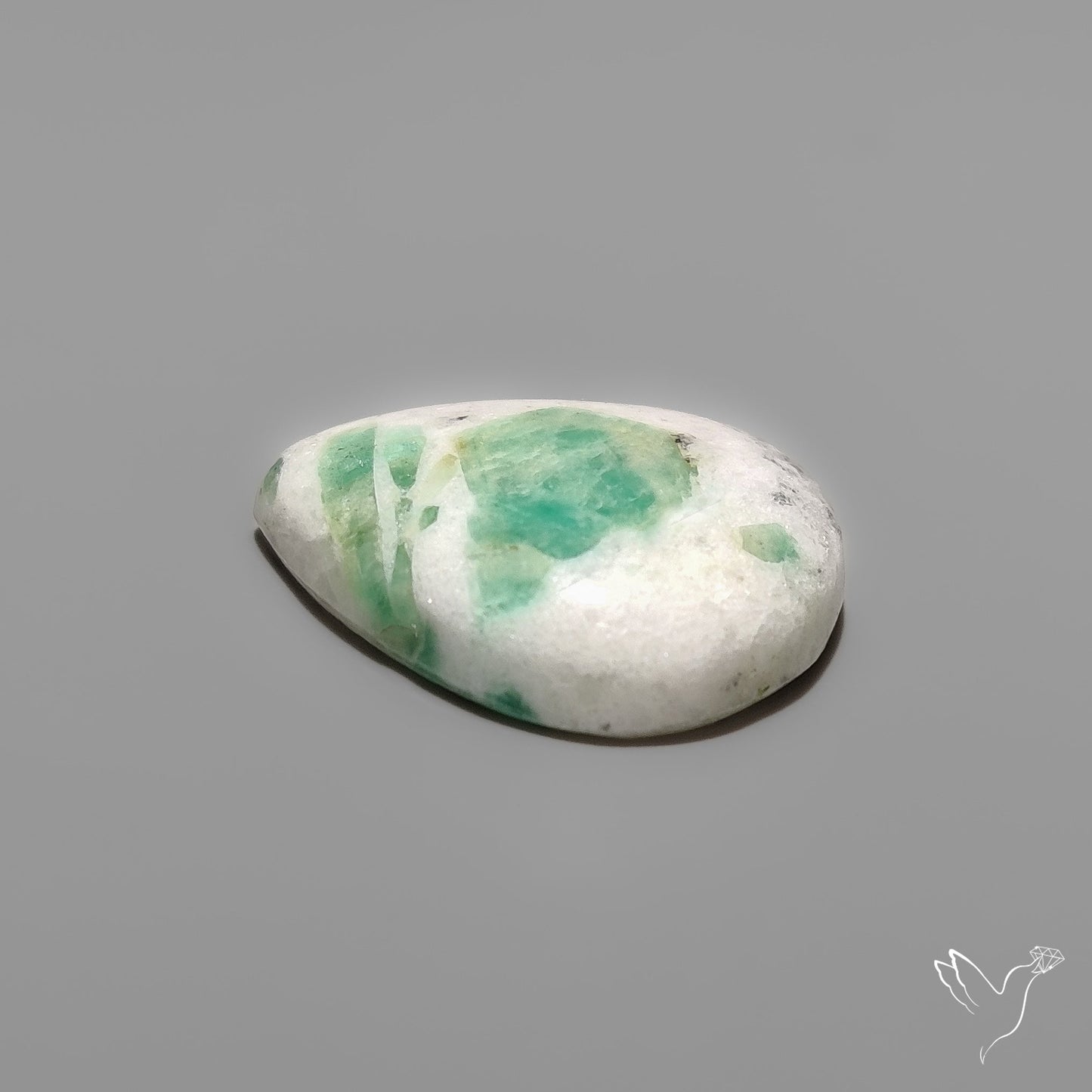 Rare Emerald in Quartz Cabochon