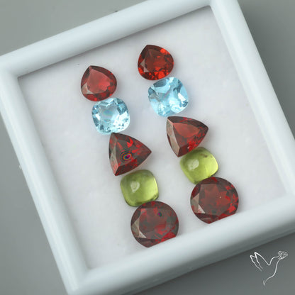 Fine Mozambique Garnets, Peridot Cabs & Sky Blue Topaz Set Rare Large Sized Garnets