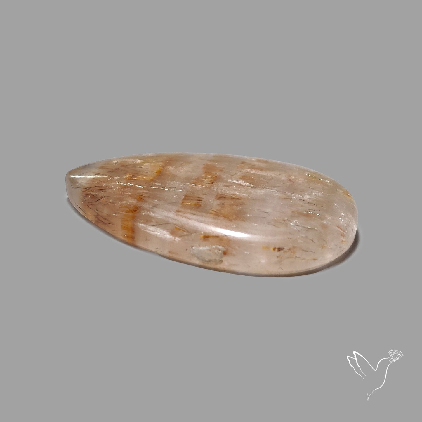 Cacoxenite in Quartz Cabochon