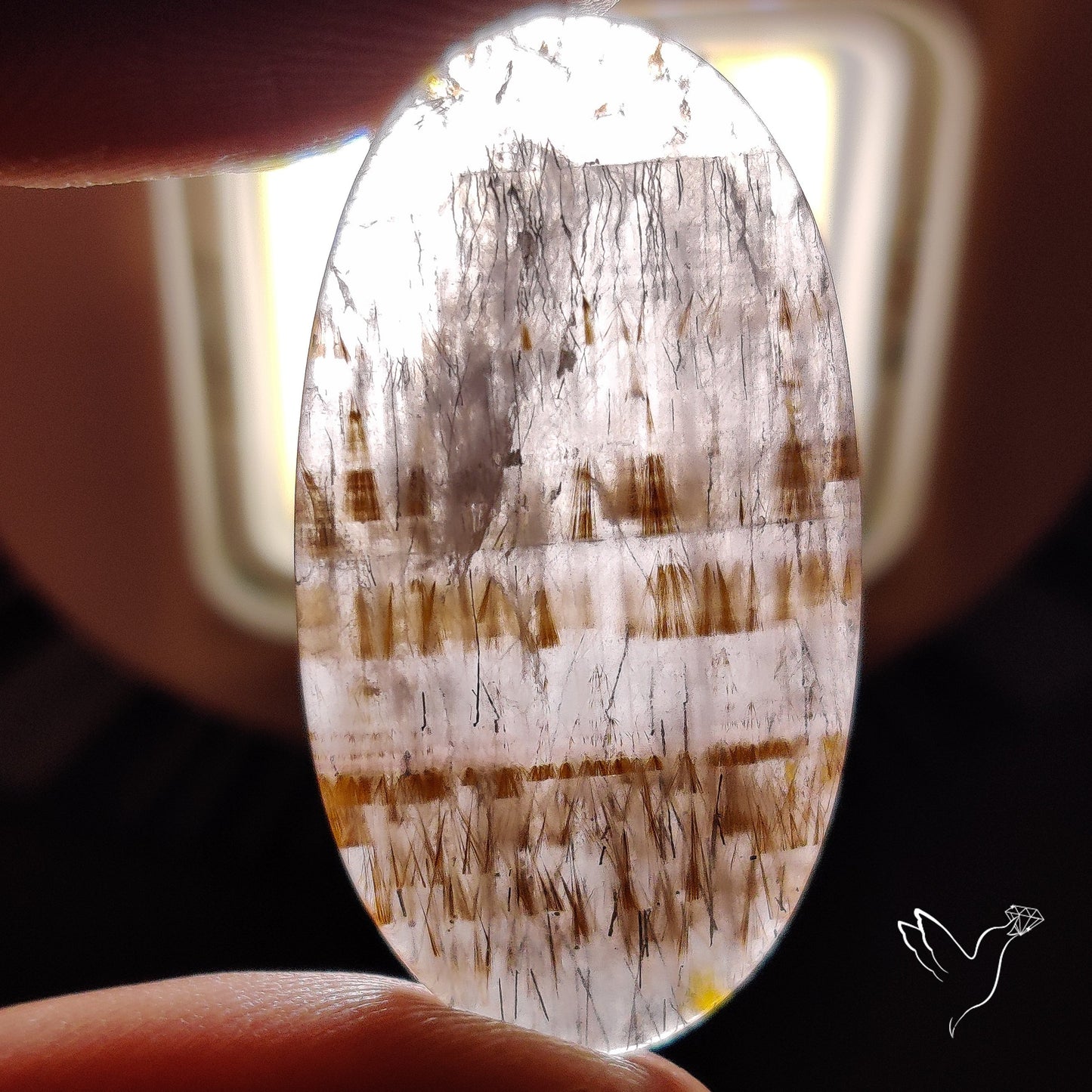Cacoxenite in Quartz Cabochon