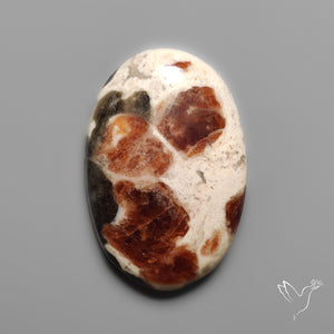 Garnet In Limestone Cabochon