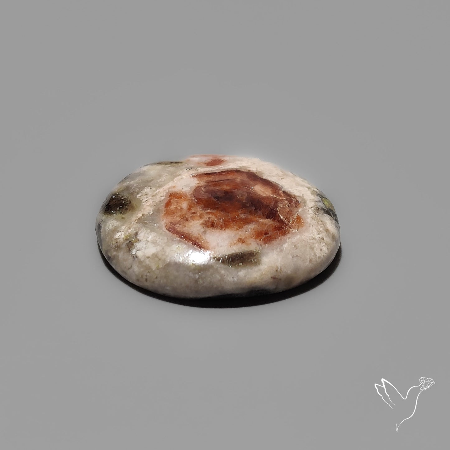 Garnet In Limestone Cabochon