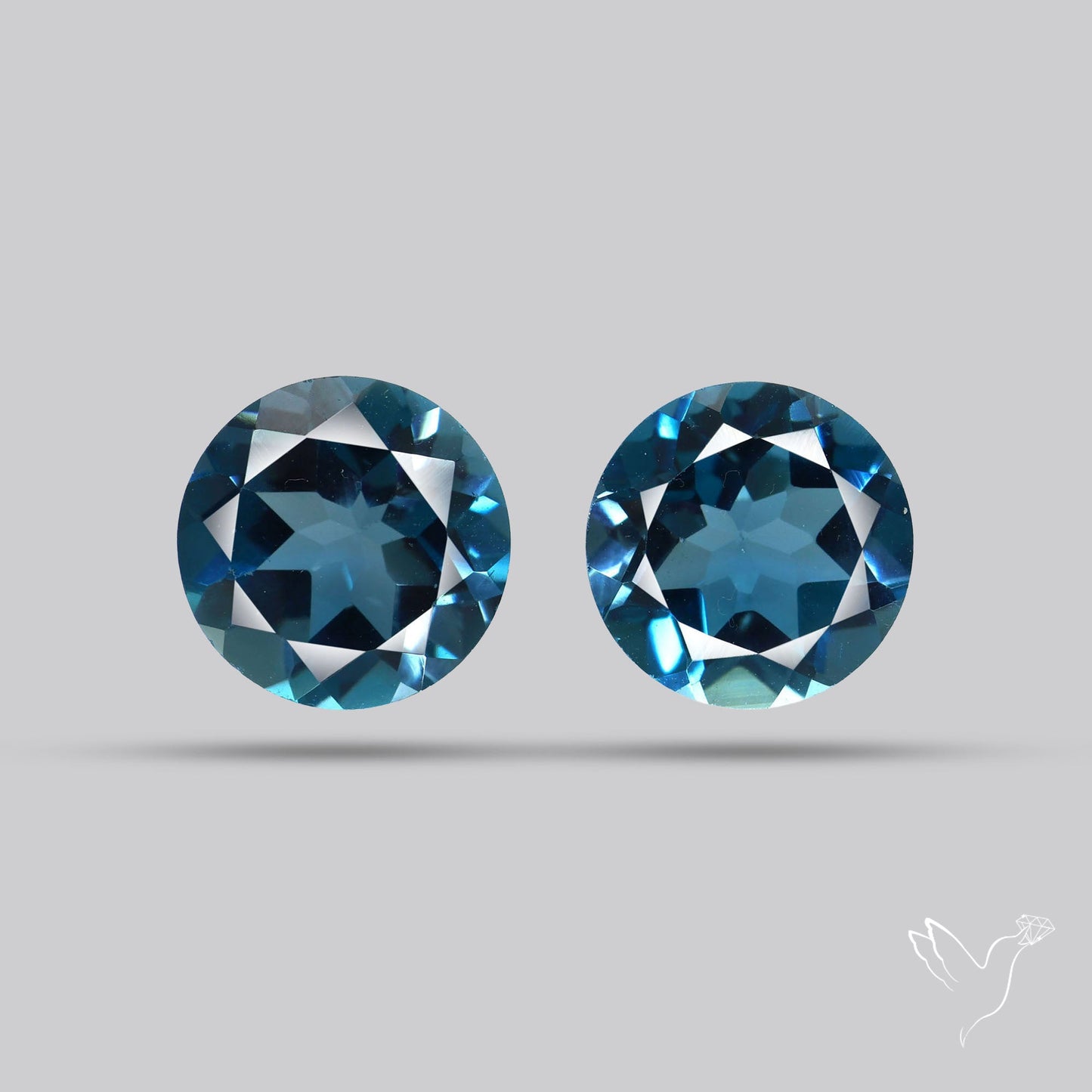 Faceted London Blue Topaz Pair