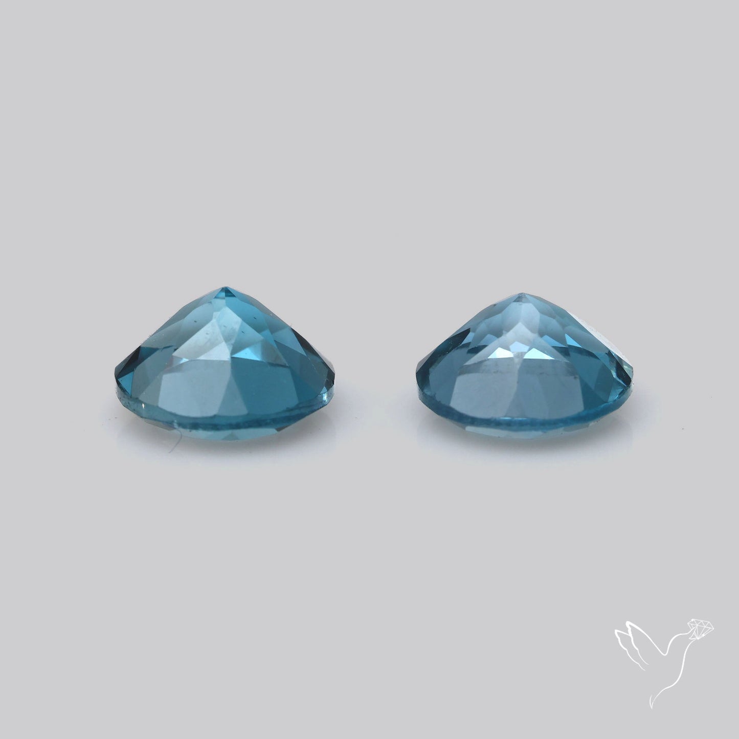 Faceted London Blue Topaz Pair