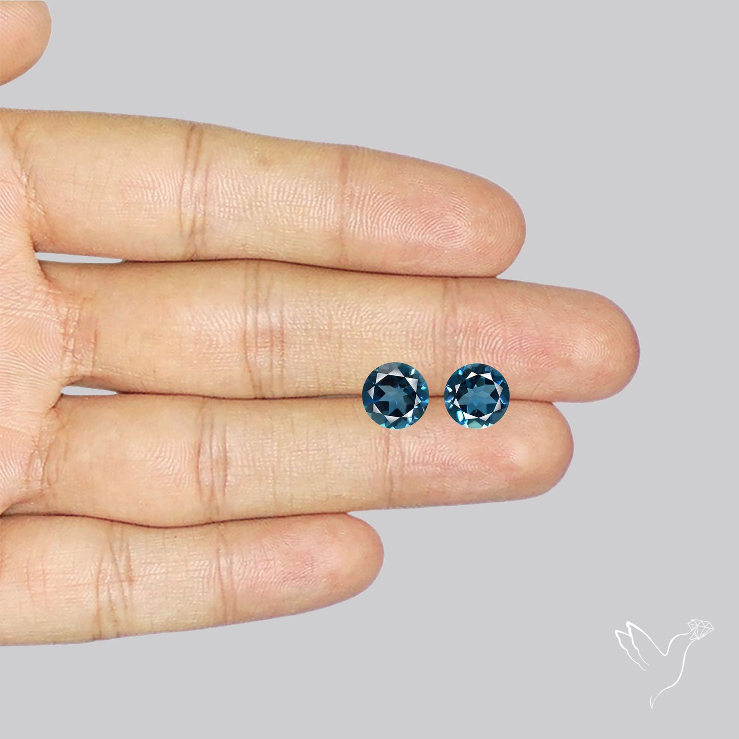 Faceted London Blue Topaz Pair