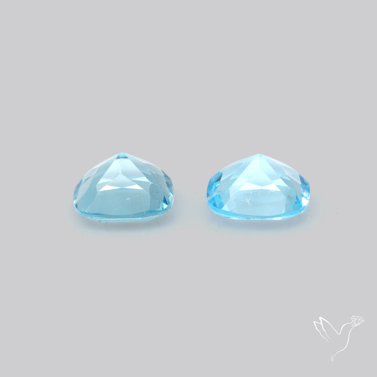Faceted Swiss Blue Topaz Pair