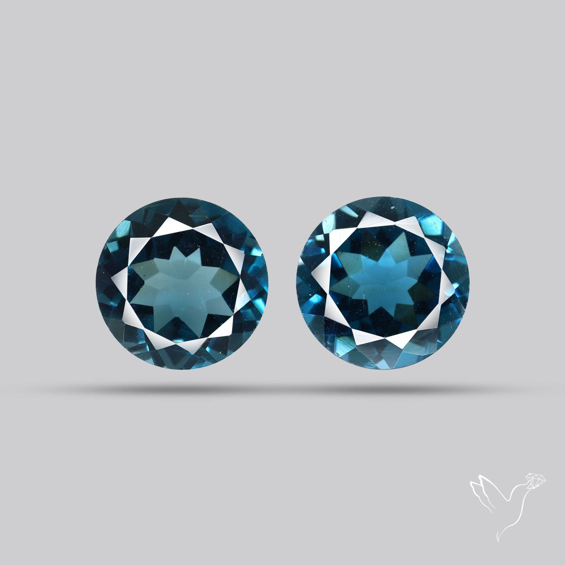 Faceted London Blue Topaz Pair