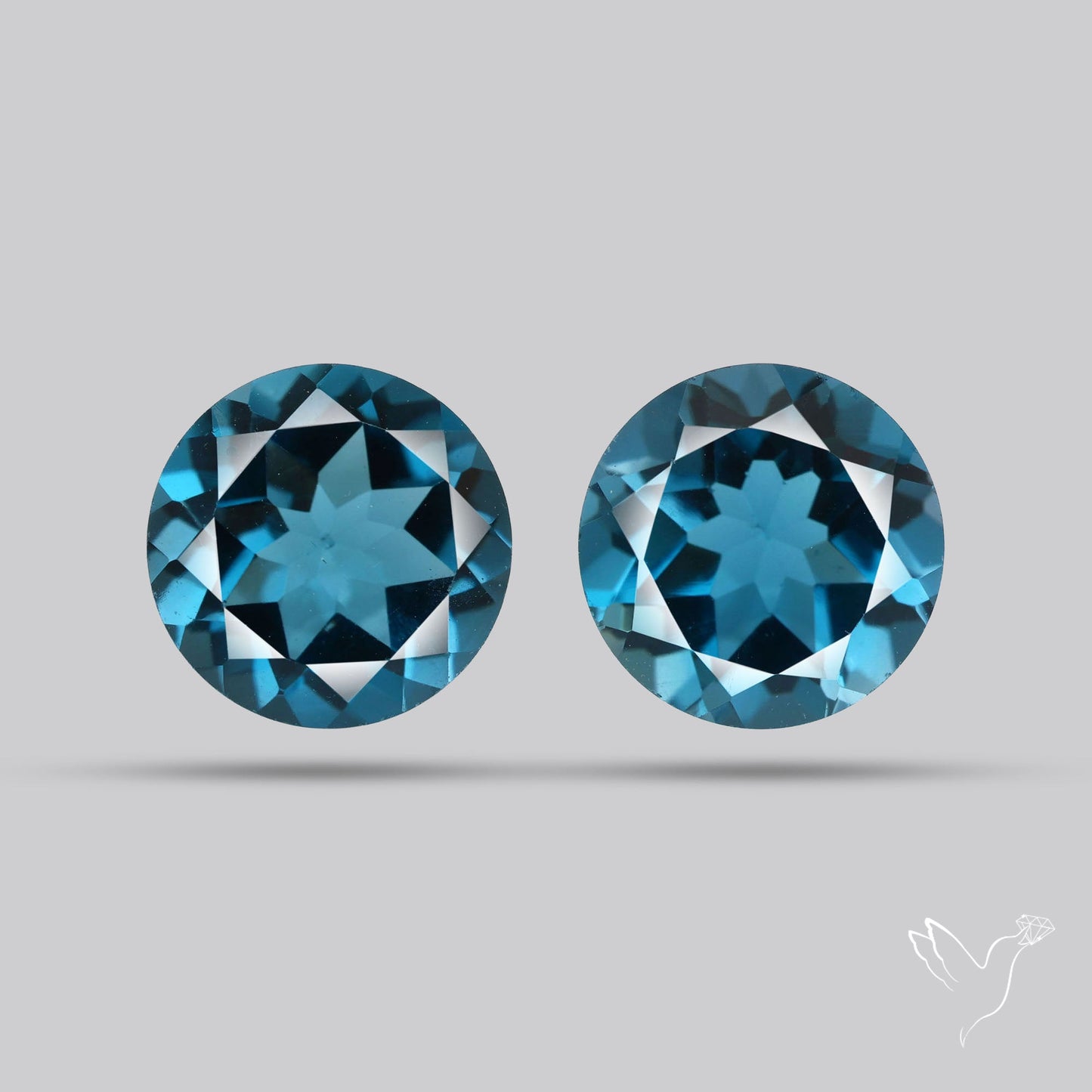 Faceted London Blue Topaz Pair