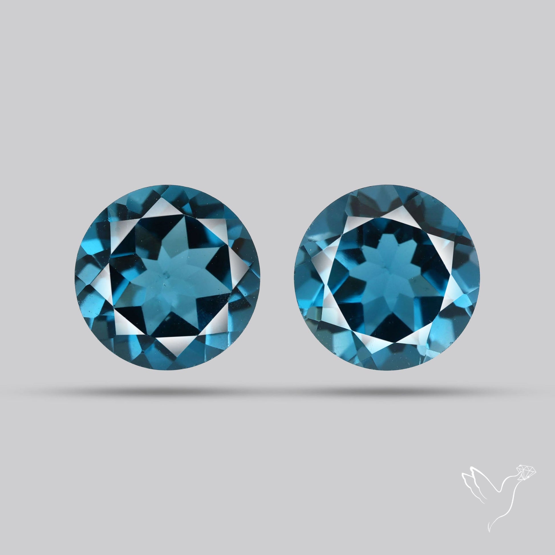 Faceted London Blue Topaz Pair